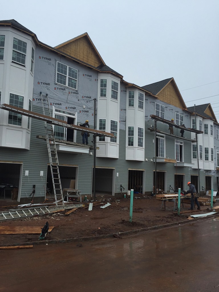 Windows and facade installation on a multifamily building